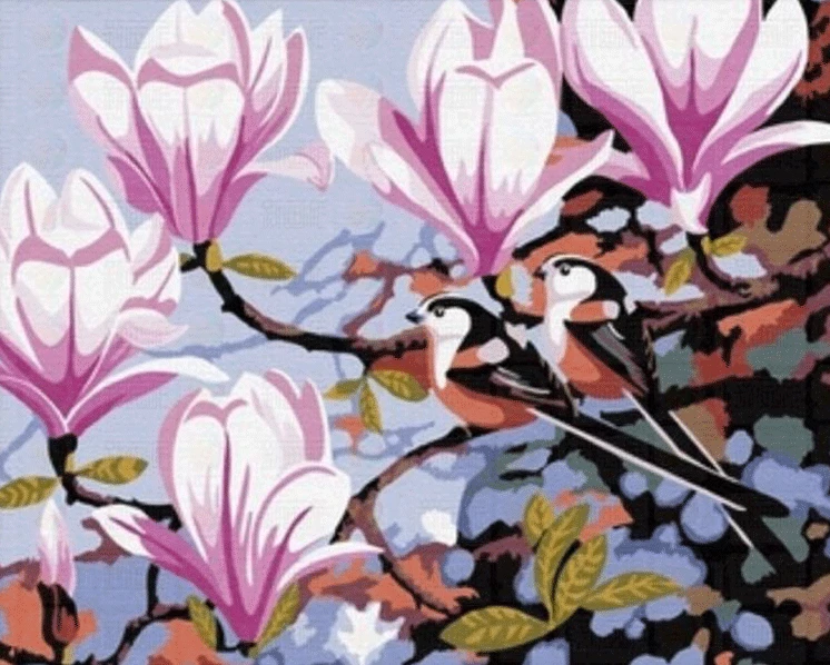 Birds in the magnolia flowers