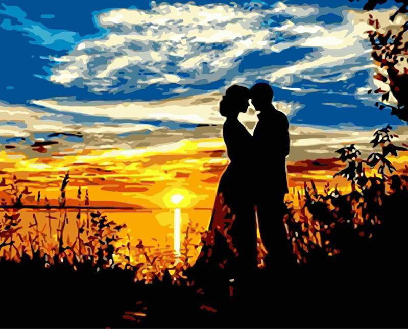 Loving couple in the sunset