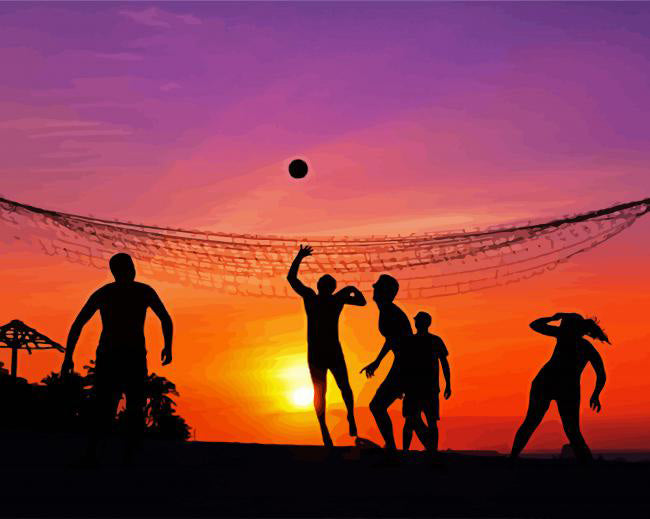 Volleyball players silhouettes at sunset